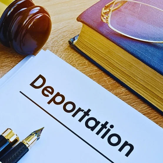 Deportation and other documents on a desk. deportation bond hearing