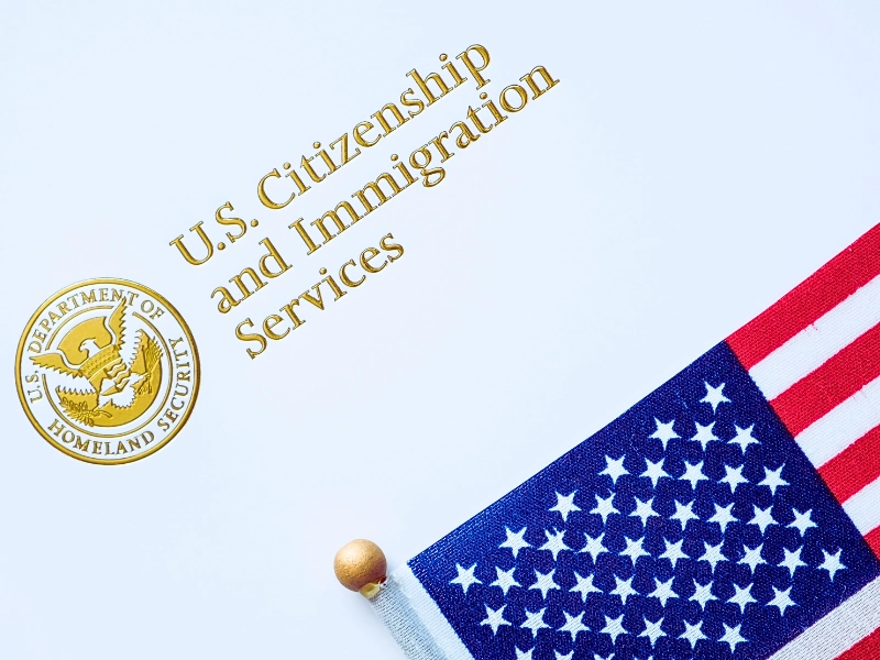 What Is a Stokes Interview and When Does USCIS Require One? 1 U.S. Citizenship and Immigration Services text with American flag. Stokes Interview